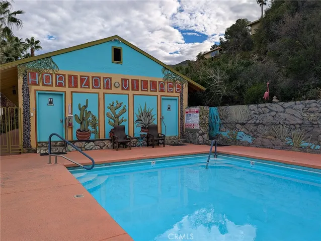 a view of outdoor space yard deck patio and fire pit
