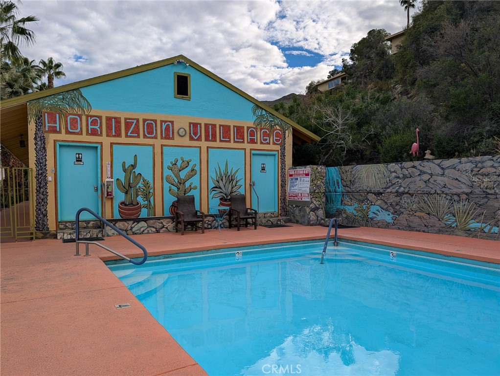 28 Jupiter Street Palm Springs, CA 92264 - Photo 21 of 26 a view of outdoor space yard deck patio and fire pit