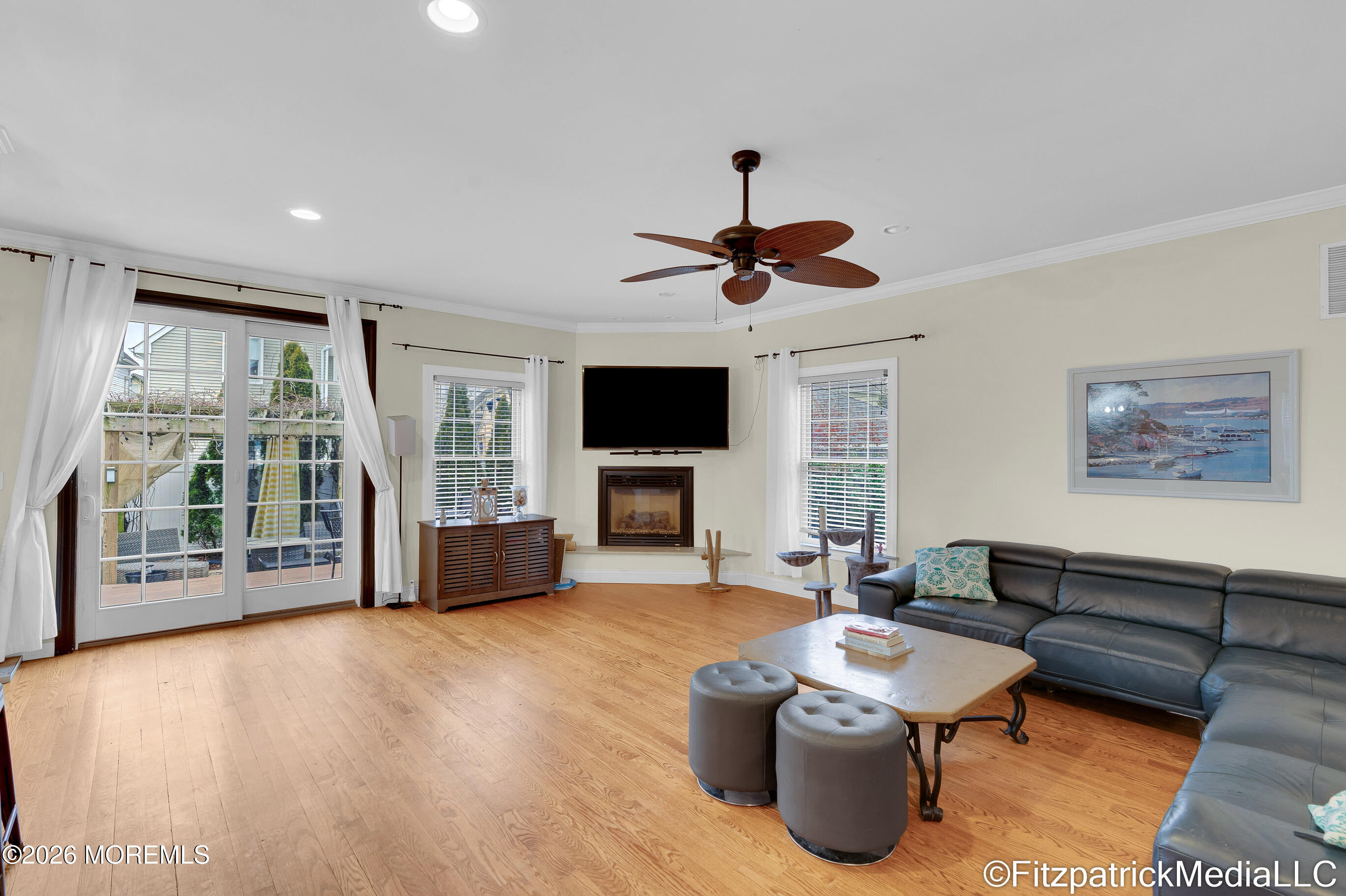 331 Richmond Avenue Point Pleasant Beach, NJ 08742 - Photo 23 of 46 a living room with furniture and a flat screen tv