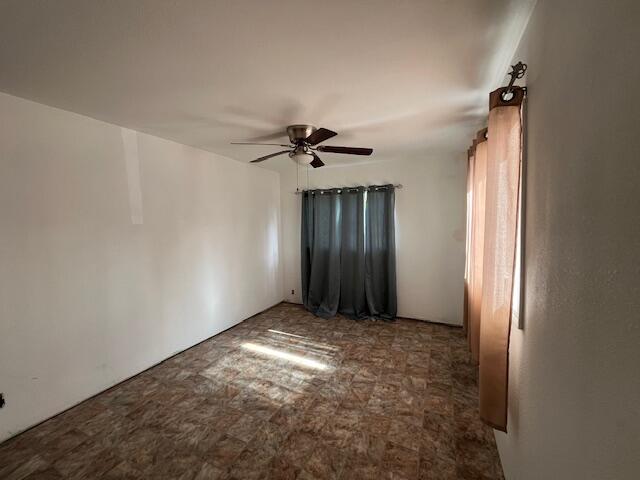 521 Temescal Street Piru, CA 93040 - Photo 13 of 16 a view of an empty room with a window