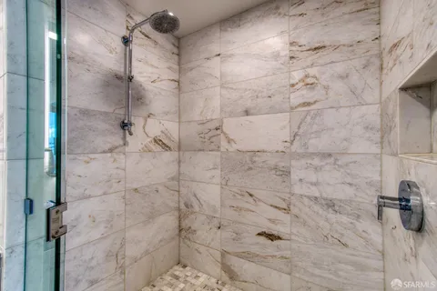 a view of a hallway with washer and dryer