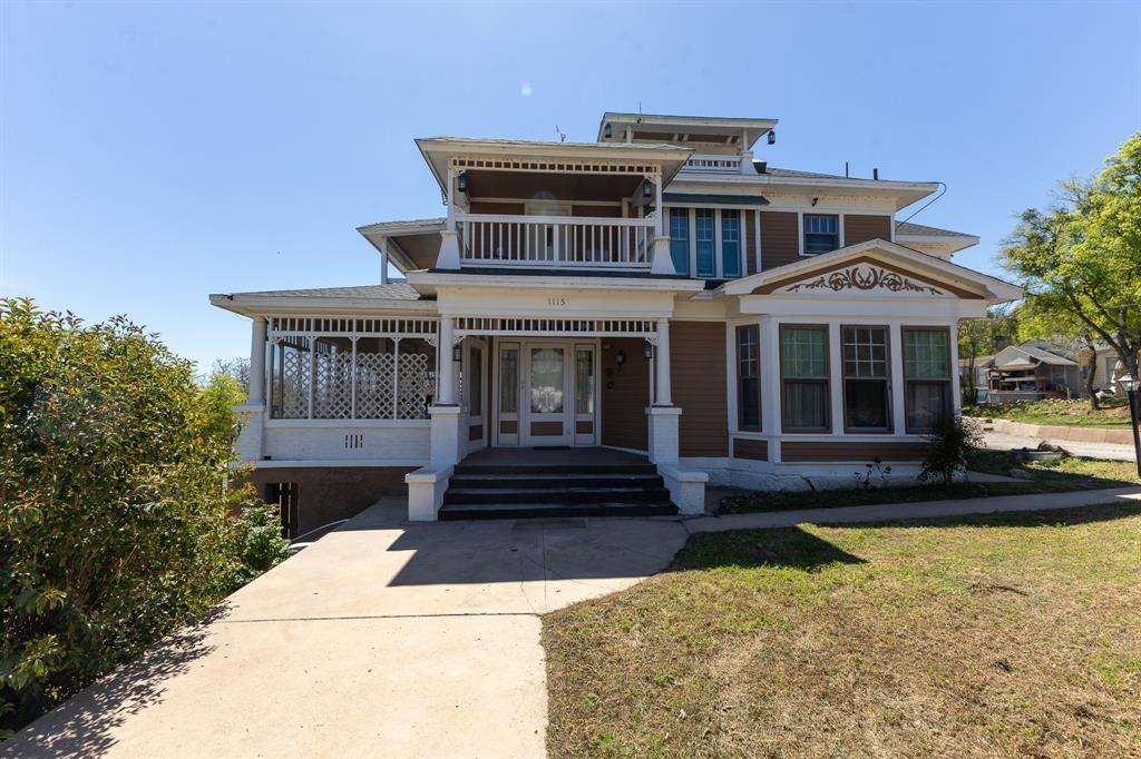 1115 Austin Street Coleman, TX 76834 - Photo 2 of 40 a front view of a house with garden