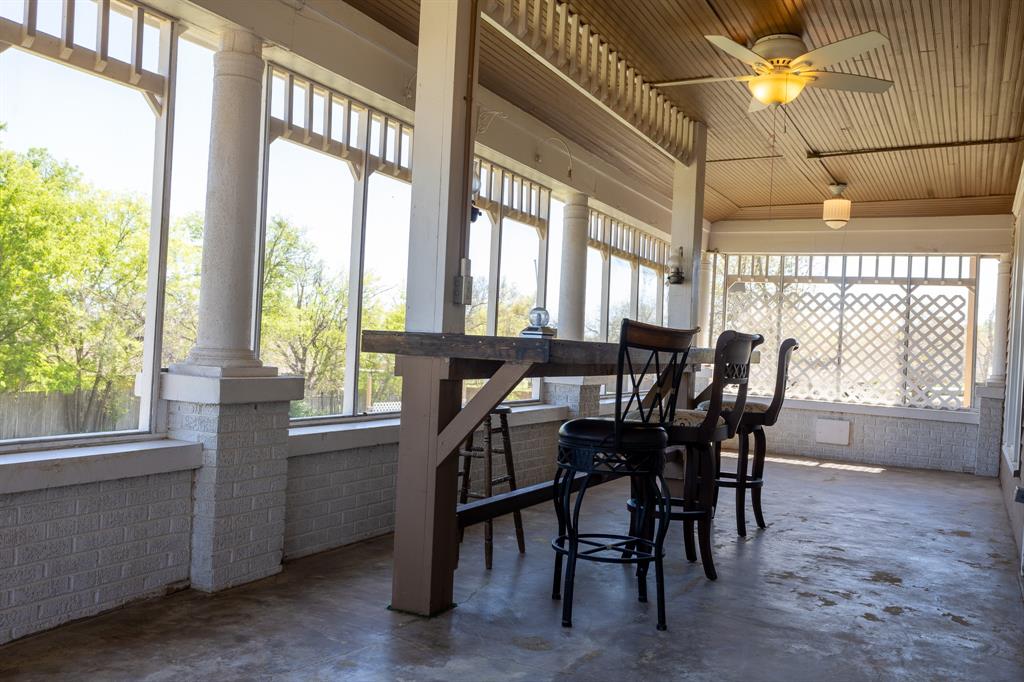 1115 Austin Street Coleman, TX 76834 - Photo 28 of 40 a view of a dining room with furniture window and outside view
