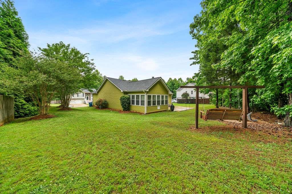 45 Highlander Trail Southwest Rome, GA 30165 - Photo 27 of 32 a house view with a garden space
