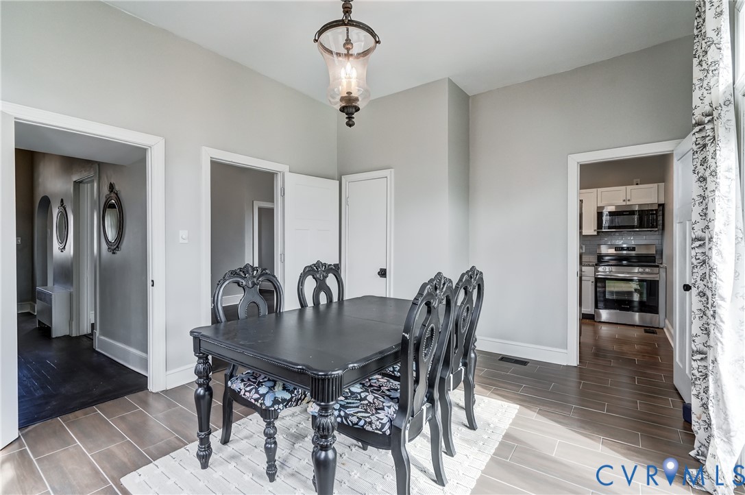 418 4th Street West Point, VA 23181 - Photo 12 of 36 a view of a dining room with furniture and wooden floor