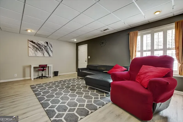 a kitchen with stainless steel appliances granite countertop a refrigerator and microwave