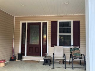 176 McLemore Road Ardmore, TN 38449 - Photo 2 of 9 a view of two chairs in front of house