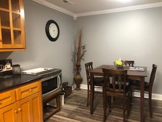 176 McLemore Road Ardmore, TN 38449 - Photo 5 of 9 a view of a kitchen with a table and chairs