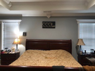176 McLemore Road Ardmore, TN 38449 - Photo 6 of 9 a bed sitting in a bedroom next to a window