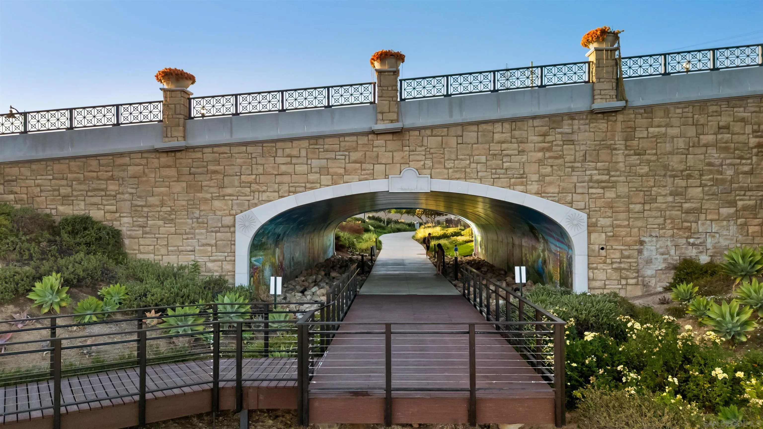 2015 Ainsley Road San Diego, CA 92123 - Photo 54 of 54 a view of a brick wall with potted plants