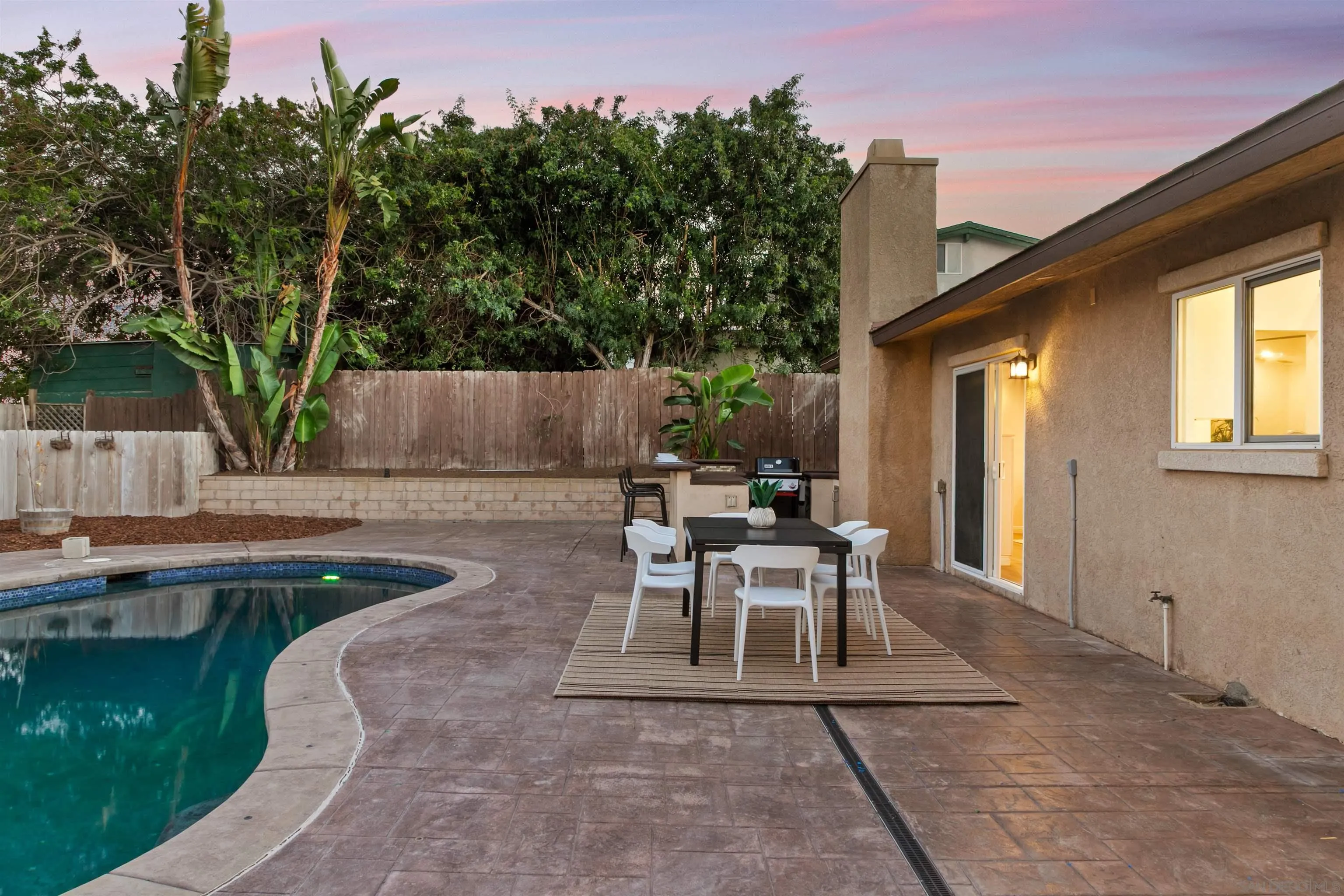 2015 Ainsley Road San Diego, CA 92123 - Photo 8 of 54 a view of backyard with patio