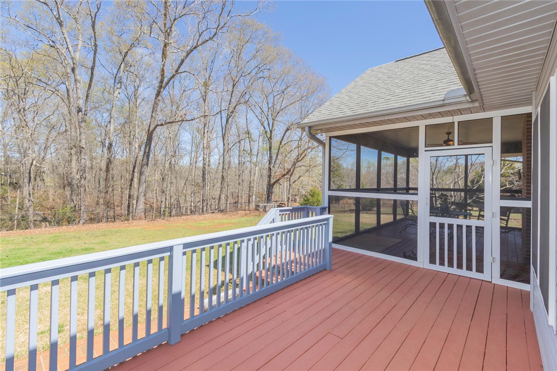 108 Pearman Drive Pendleton, SC 29670 - Photo 41 of 50 This inviting outdoor space features a spacious deck and a comfortable screened porch, perfect for enjoying nature.