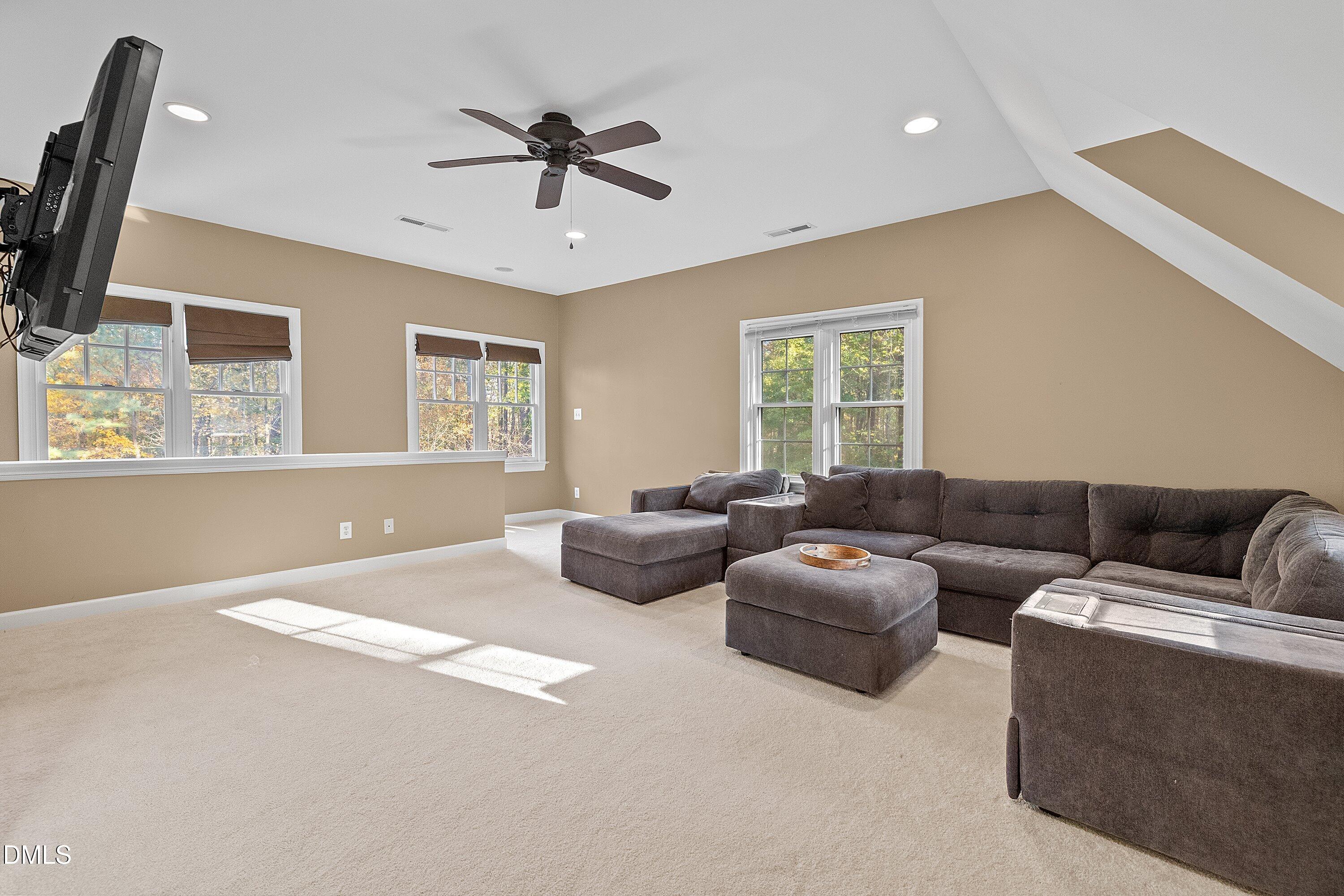 4820 Sandberry Lane Raleigh, NC 27613 - Photo 61 of 99 Great bonus space to relax and entertain w/gas fireplace!