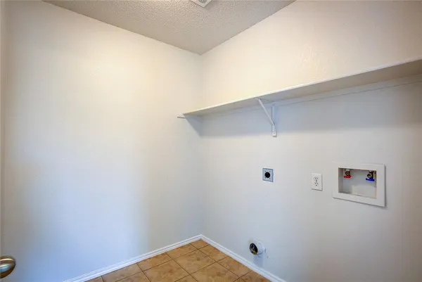 a view of small space with racks on the wall