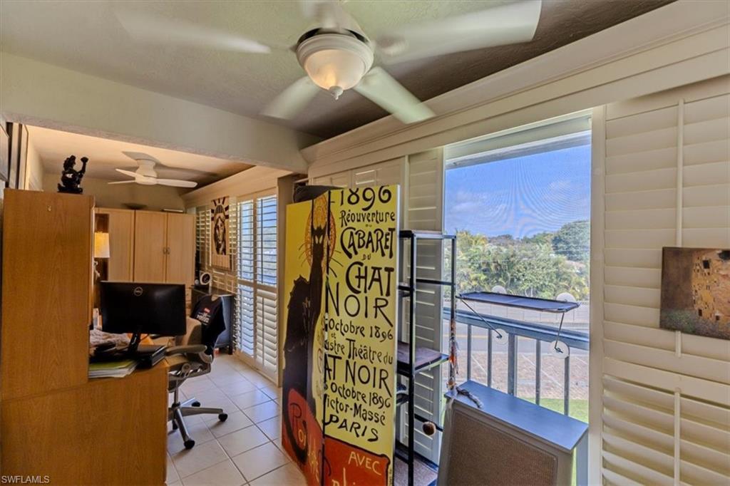 5 High Point Circle West, Unit 308 Naples, FL 34103 - Photo 20 of 28 a view of a room with gym equipment