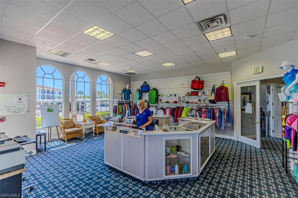 5 High Point Circle West, Unit 308 Naples, FL 34103 - Photo 25 of 28 a living room with furniture
