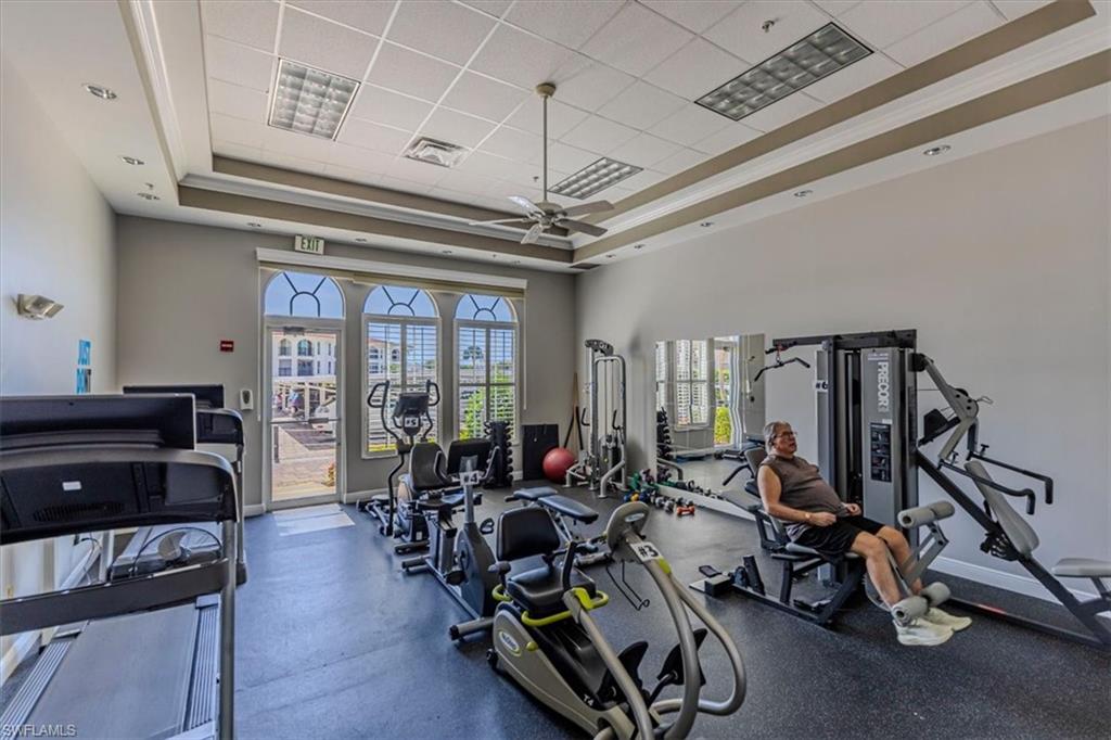 5 High Point Circle West, Unit 308 Naples, FL 34103 - Photo 26 of 28 a view of a room with gym equipment