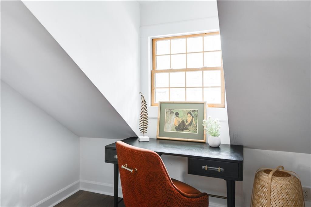 950 Austin Avenue Northeast Atlanta, GA 30307 - Photo 28 of 32 wooden floor in an empty room with a window