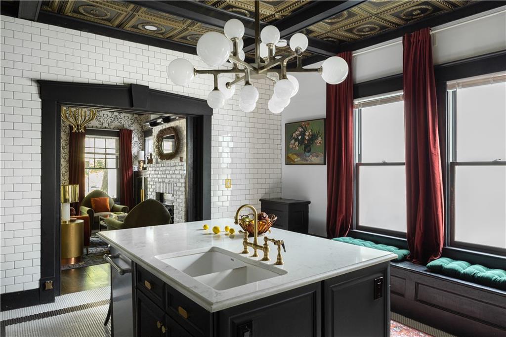 950 Austin Avenue Northeast Atlanta, GA 30307 - Photo 9 of 32 a view of a dining room with a table and chairs