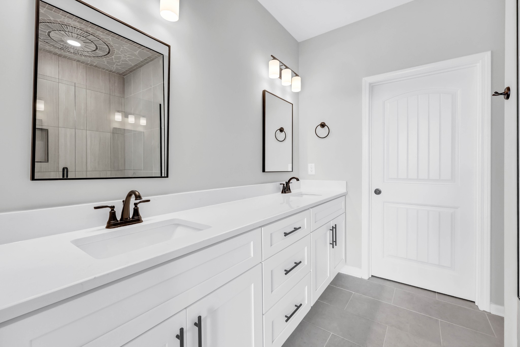 2395 Pea Ridge Road Clarksville, TN 37040 - Photo 20 of 36 a bathroom with double vanity sink and a mirror