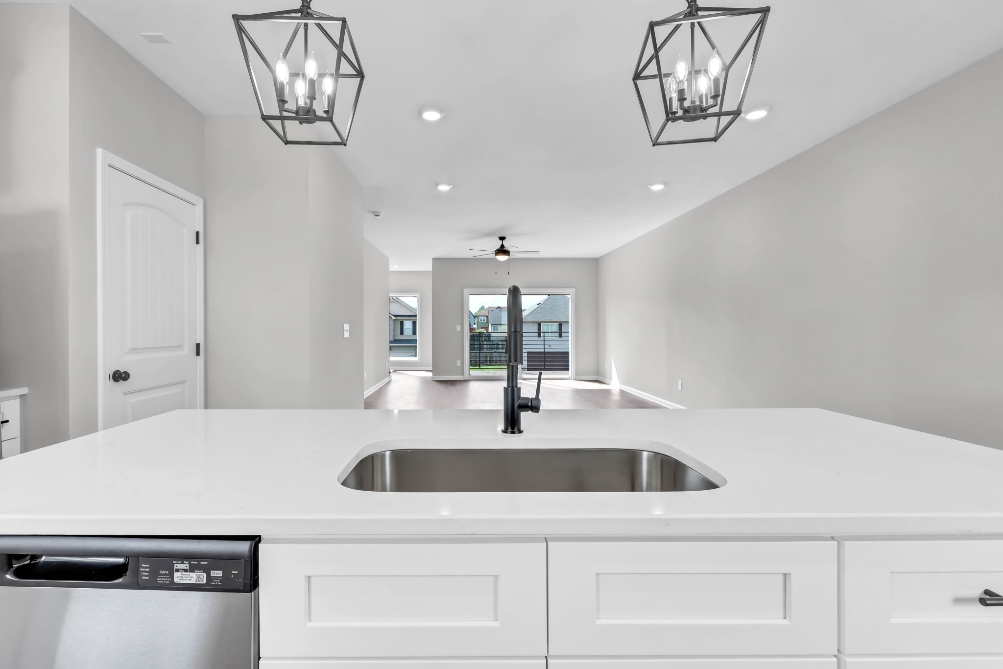 2395 Pea Ridge Road Clarksville, TN 37040 - Photo 10 of 36 a kitchen with a sink and chandelier