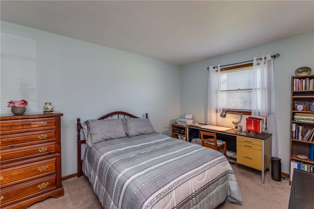 4210 Pleasanton Road Englewood, OH 45322 - Photo 25 of 34 This cozy bedroom provides a comfortable and functional living space.