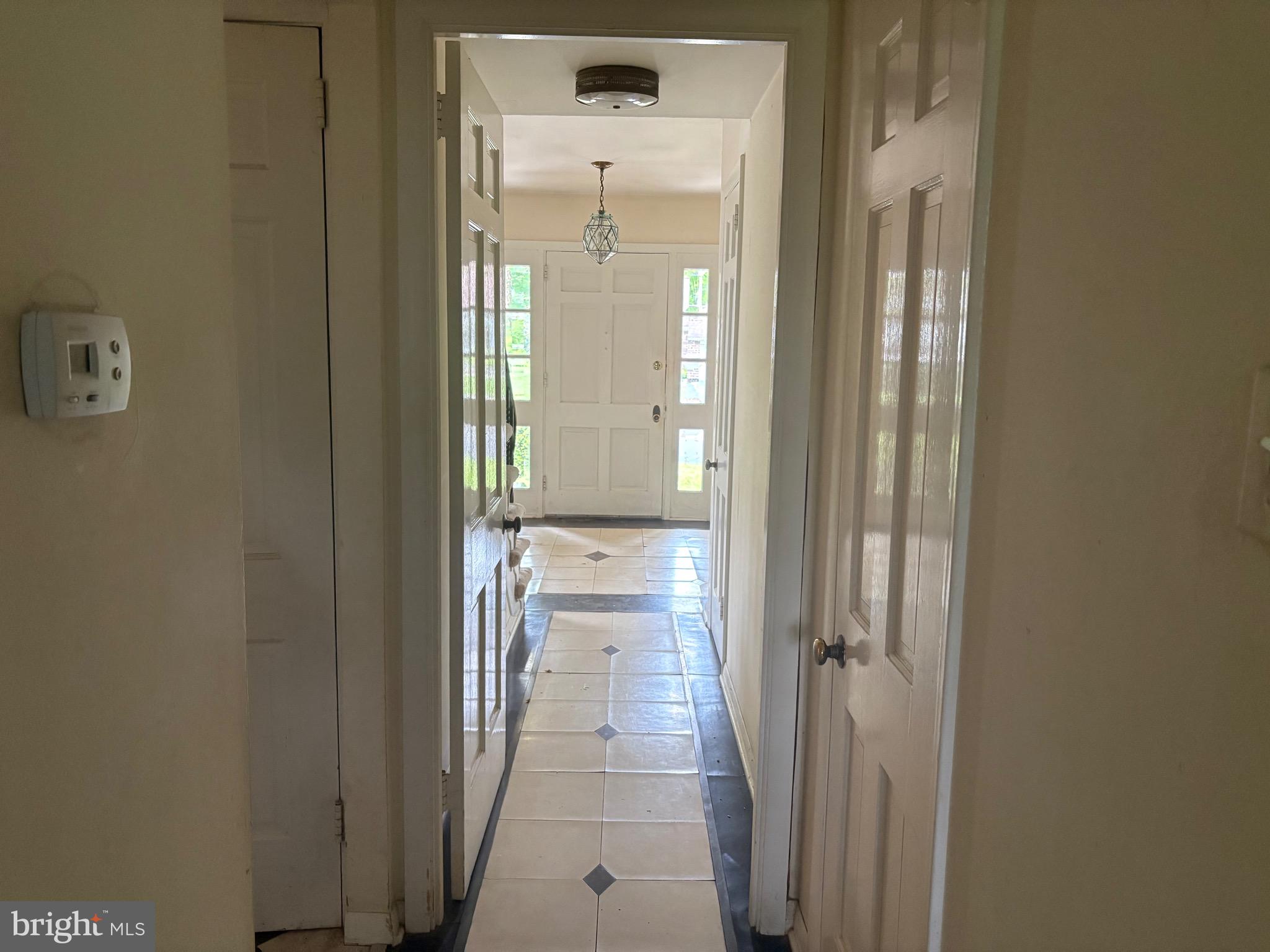 1041 Kipling Road Jenkintown, PA 19046 - Photo 11 of 23 a view of a bathroom from a hallway