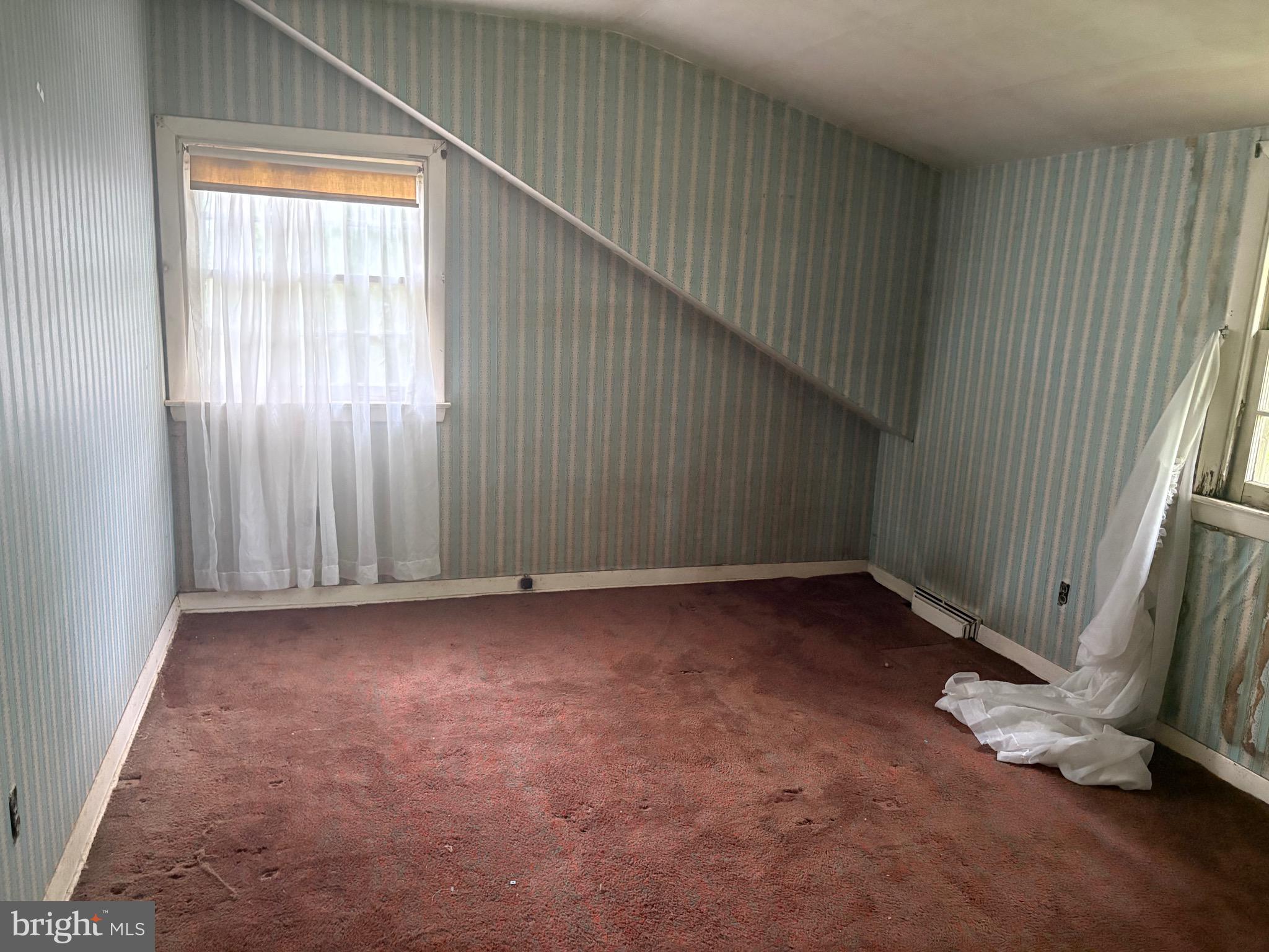 1041 Kipling Road Jenkintown, PA 19046 - Photo 17 of 23 an empty room with a window