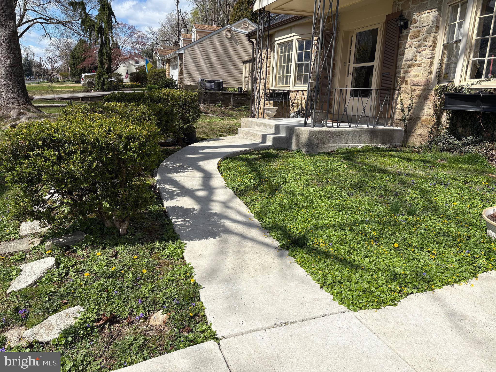 1041 Kipling Road Jenkintown, PA 19046 - Photo 20 of 23 a front view of a house with garden