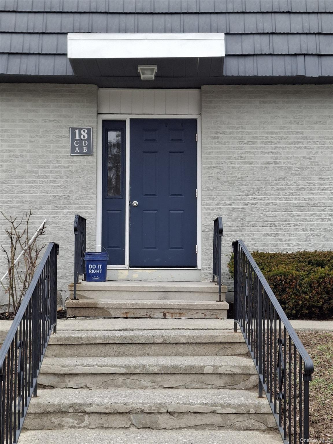 a view of entryway with a staircase