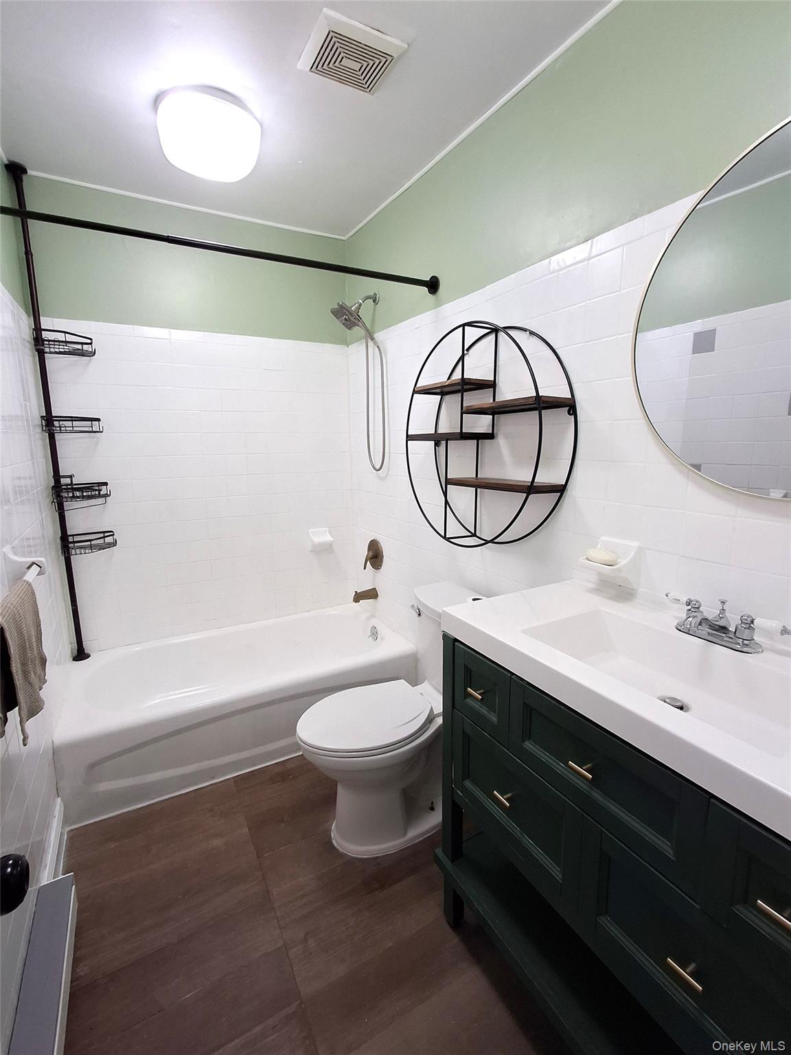 18 White Gate Road, Unit C Wappingers Falls, NY 12590 - Photo 11 of 21 a bathroom with a sink and a mirror