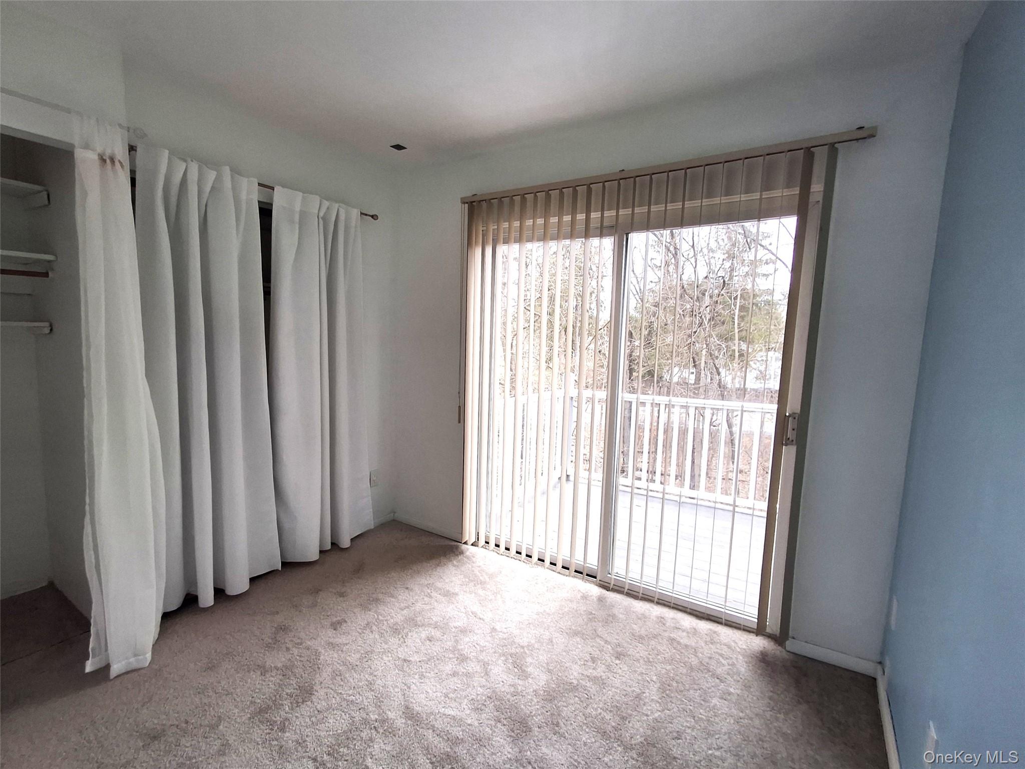 18 White Gate Road, Unit C Wappingers Falls, NY 12590 - Photo 16 of 21 a view of a room with a large window