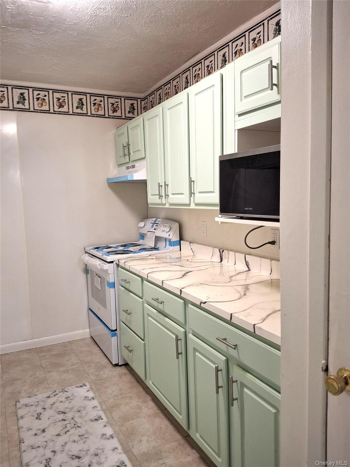 18 White Gate Road, Unit C Wappingers Falls, NY 12590 - Photo 9 of 21 a bathroom with a sink a mirror and a window