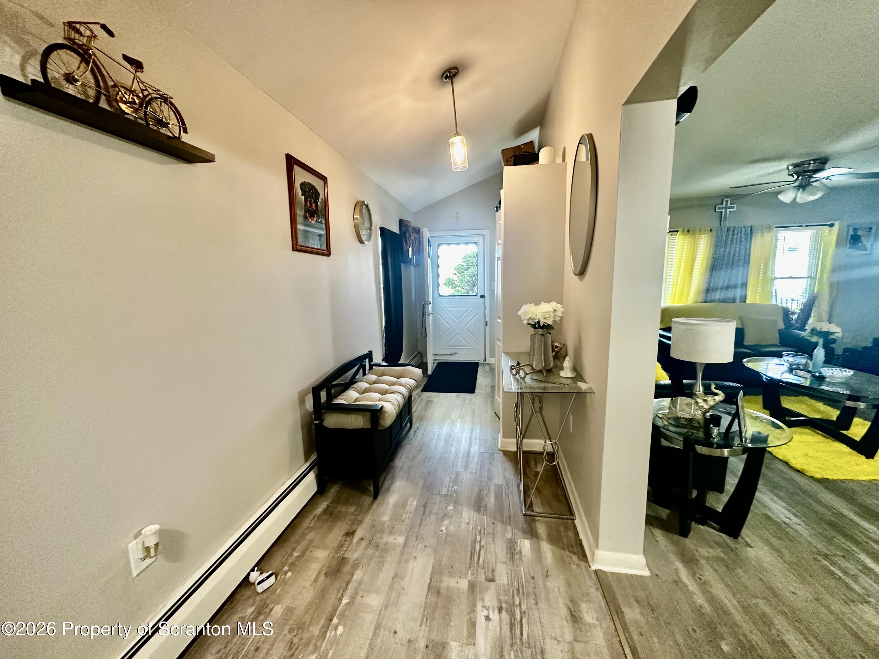 1727 Bulwer Street Scranton, PA 18504 - Photo 19 of 40 a living room with furniture and a wooden floor