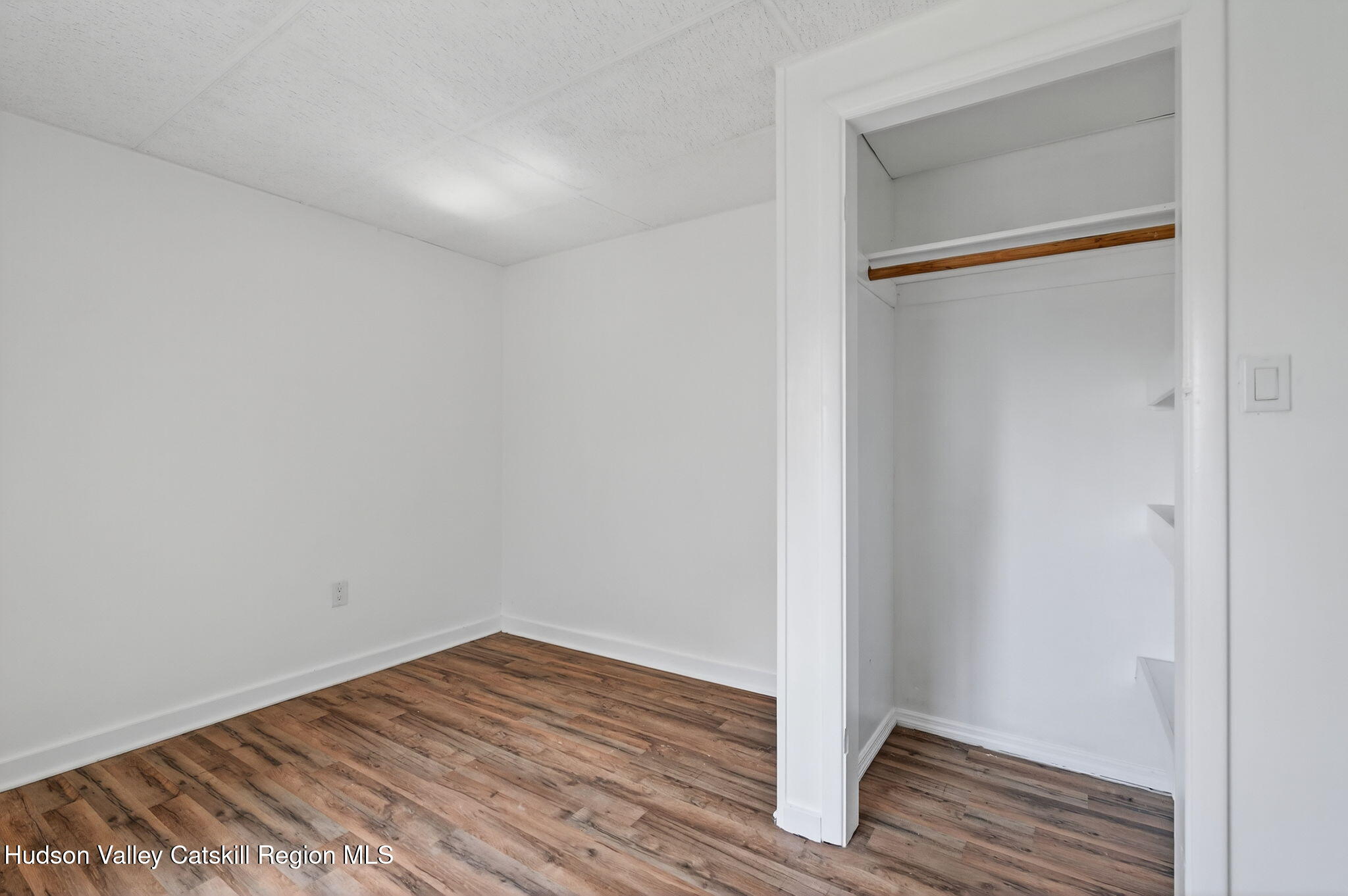 17 New Street, Unit # 3 Catskill, NY 12414 - Photo 12 of 23 a view of a small space with wooden floor and closet