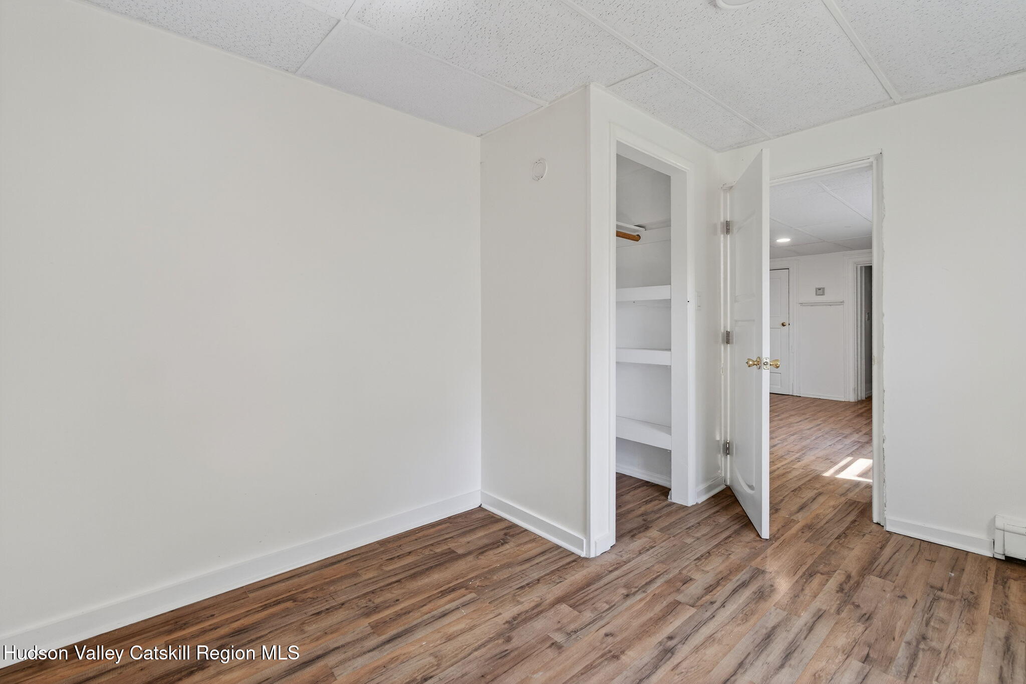 17 New Street, Unit # 3 Catskill, NY 12414 - Photo 14 of 23 a view of wooden floor in an empty room