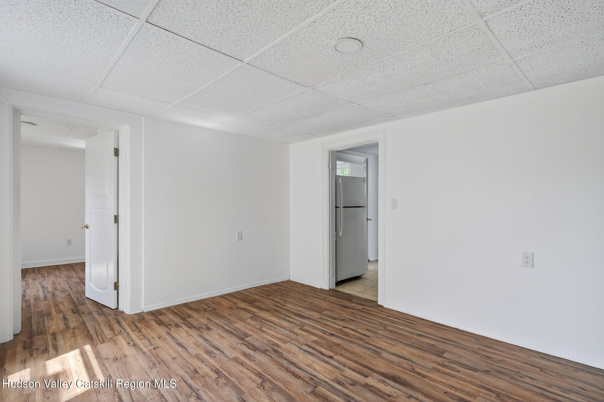 17 New Street, Unit # 3 Catskill, NY 12414 - Photo 18 of 23 a view of empty room with wooden floor