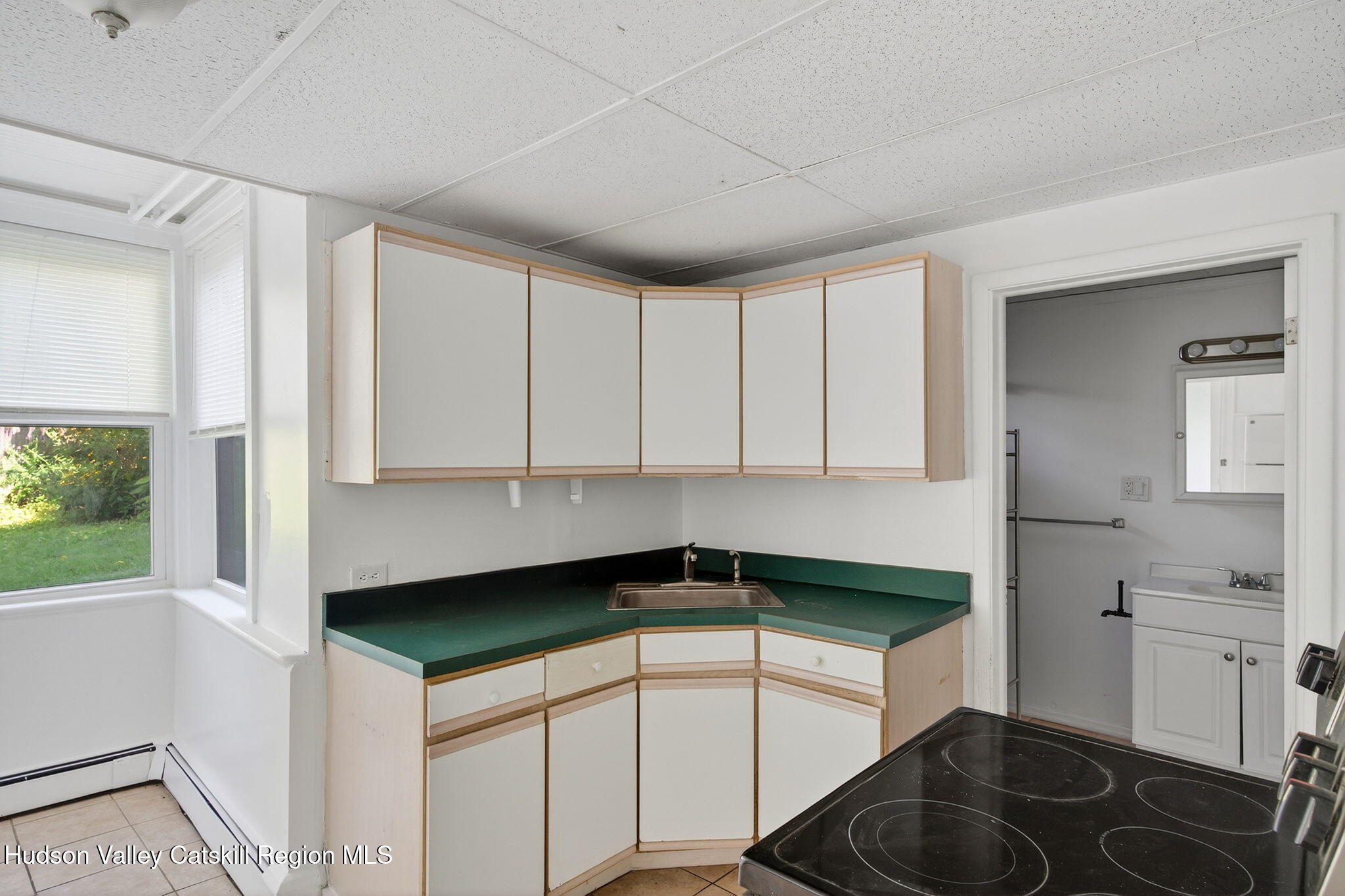 17 New Street, Unit # 3 Catskill, NY 12414 - Photo 3 of 23 a kitchen with a sink cabinets and window