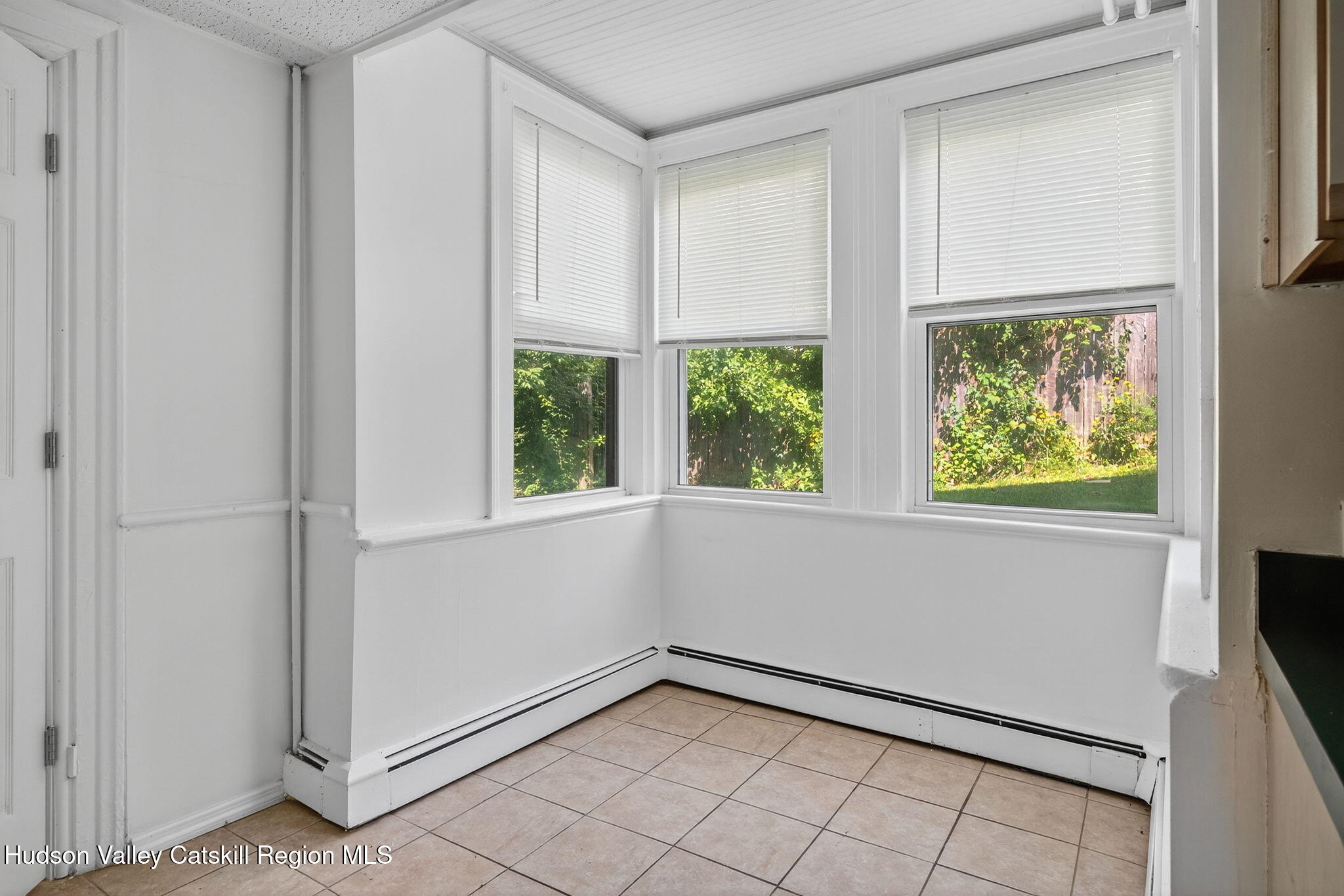 17 New Street, Unit # 3 Catskill, NY 12414 - Photo 5 of 23 an empty room with windows
