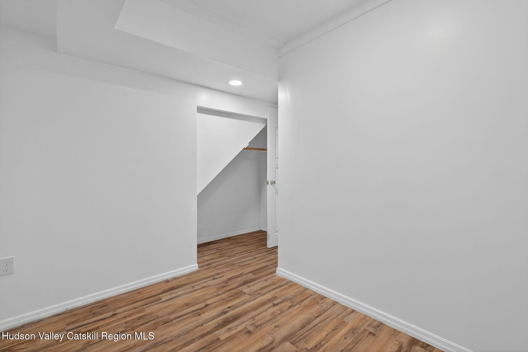 17 New Street, Unit # 3 Catskill, NY 12414 - Photo 7 of 23 a view of an empty room with wooden floor