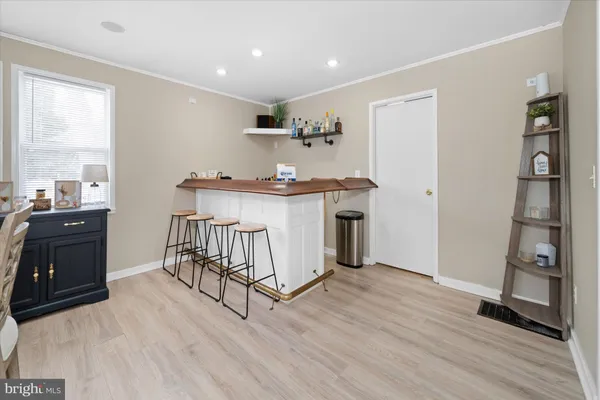 a kitchen with stainless steel appliances granite countertop a stove and a refrigerator