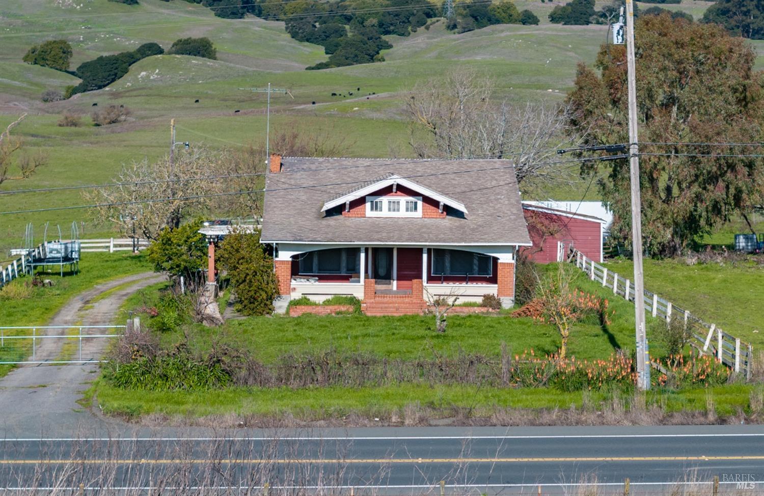 4695 Old Adobe Road Petaluma, CA 94954 - Photo 10 of 25 a front view of a house with a yard