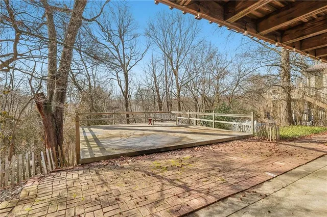 a view of a backyard with trees