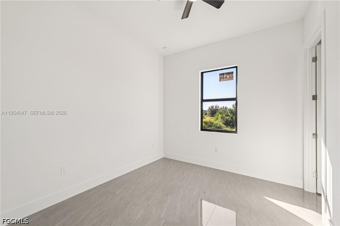 4402 East 19th Street Lehigh Acres, FL 33972 - Photo 13 of 27 a view of an empty room