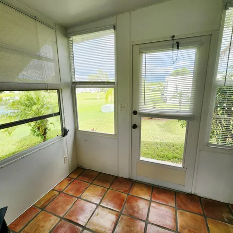 a view of a entryway door of house