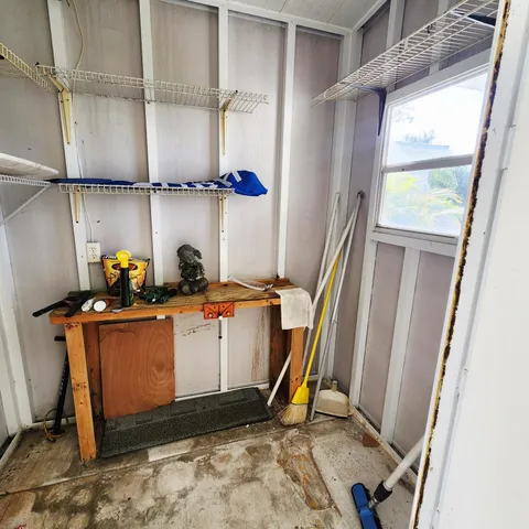 a view of a lake with houses in the back