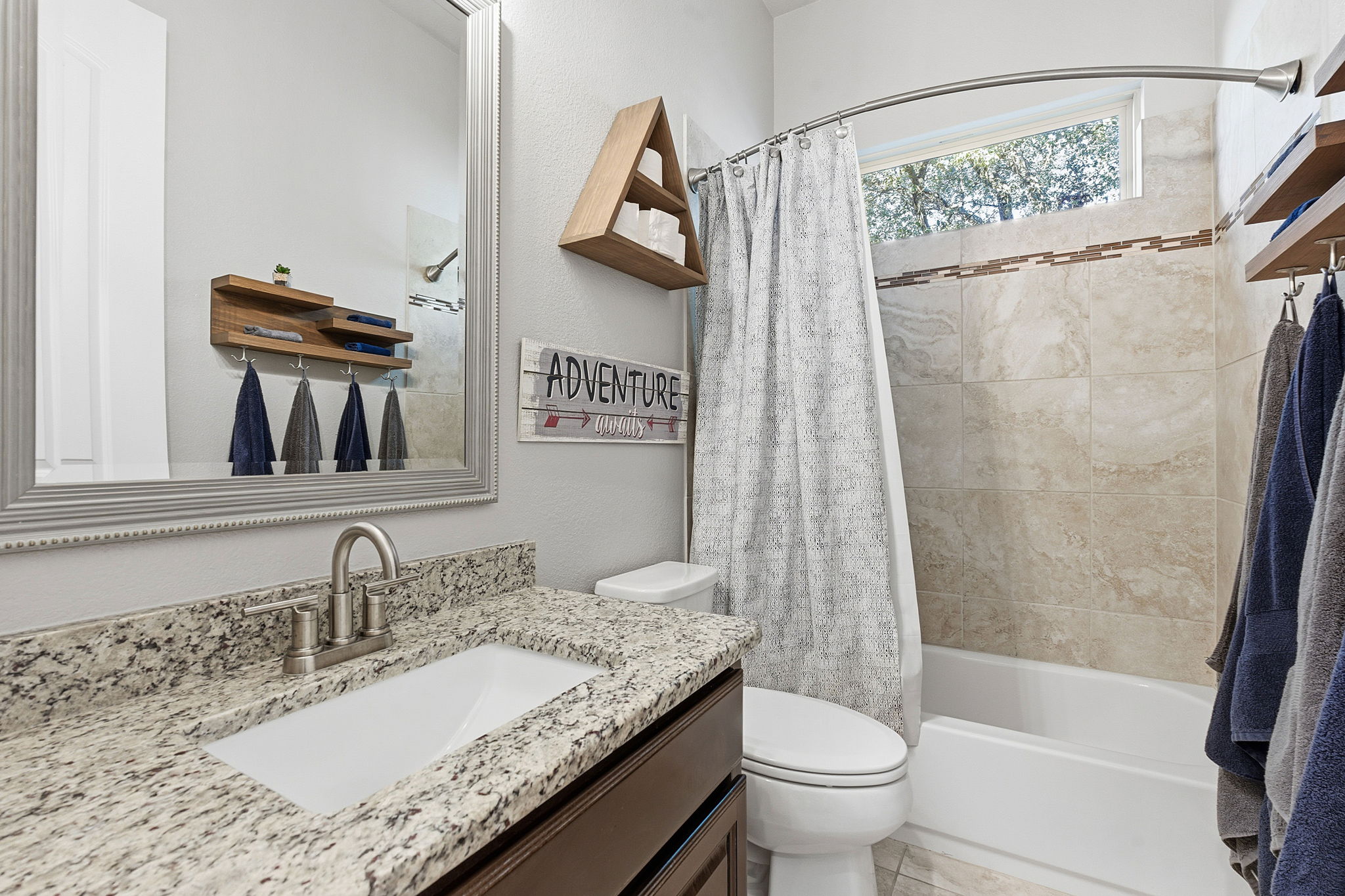 512 Choke Canyon Lane Georgetown, TX 78628 - Photo 19 of 37 Bathroom with shower / bath combo with shower curtain and vanity