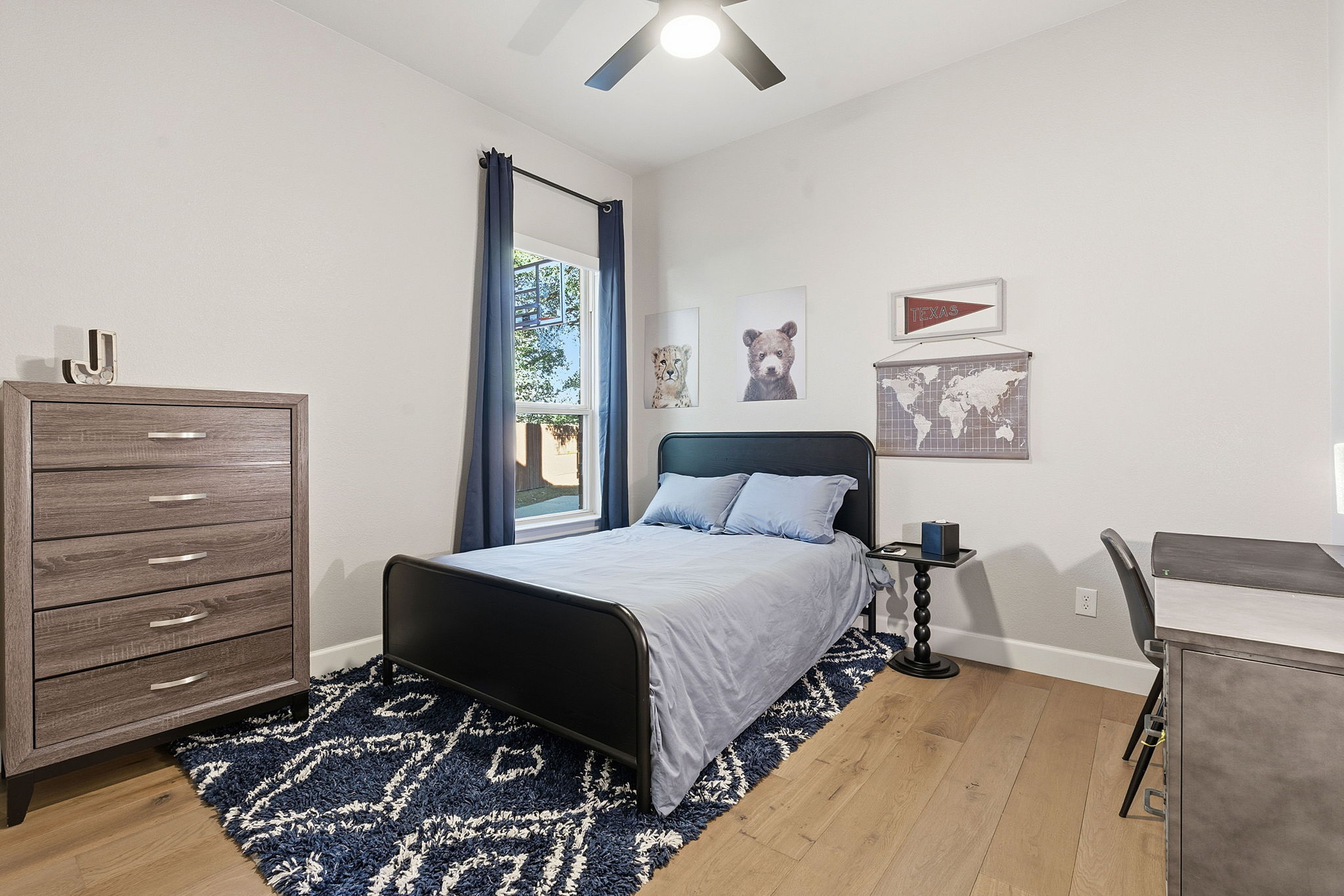 512 Choke Canyon Lane Georgetown, TX 78628 - Photo 20 of 37 Bedroom with light wood-style flooring and ceiling fan