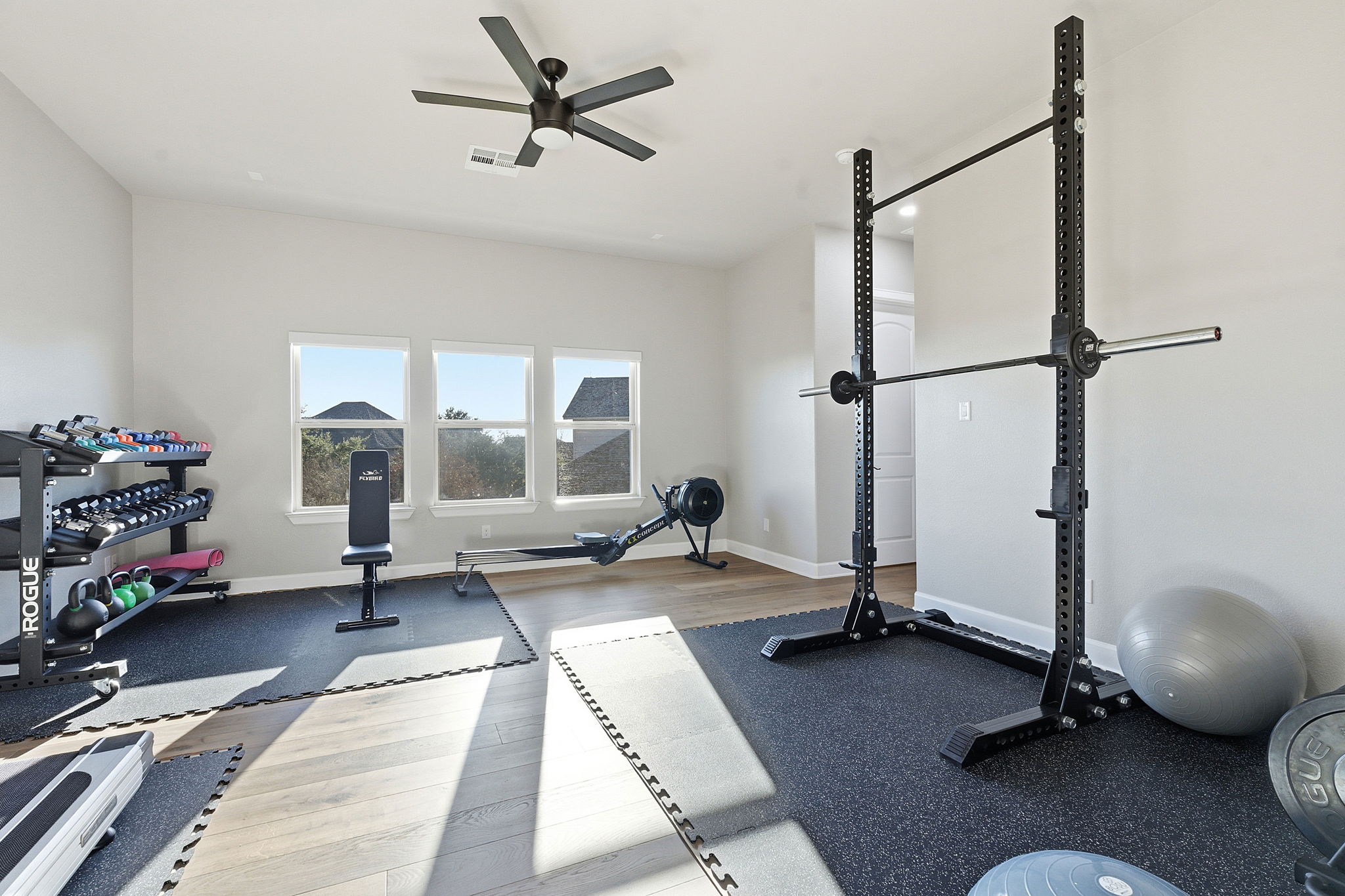 512 Choke Canyon Lane Georgetown, TX 78628 - Photo 25 of 37 Workout room featuring ceiling fan and wood finished floors