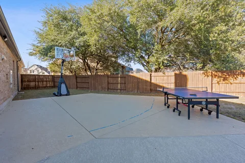 a view of a tables and chairs in a patio